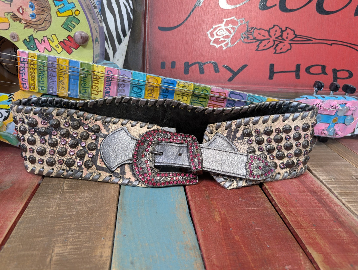 Kurtman Rose Rebel statement belt with snakeskin pattern, pink stones, dark studs and whipstitch edging