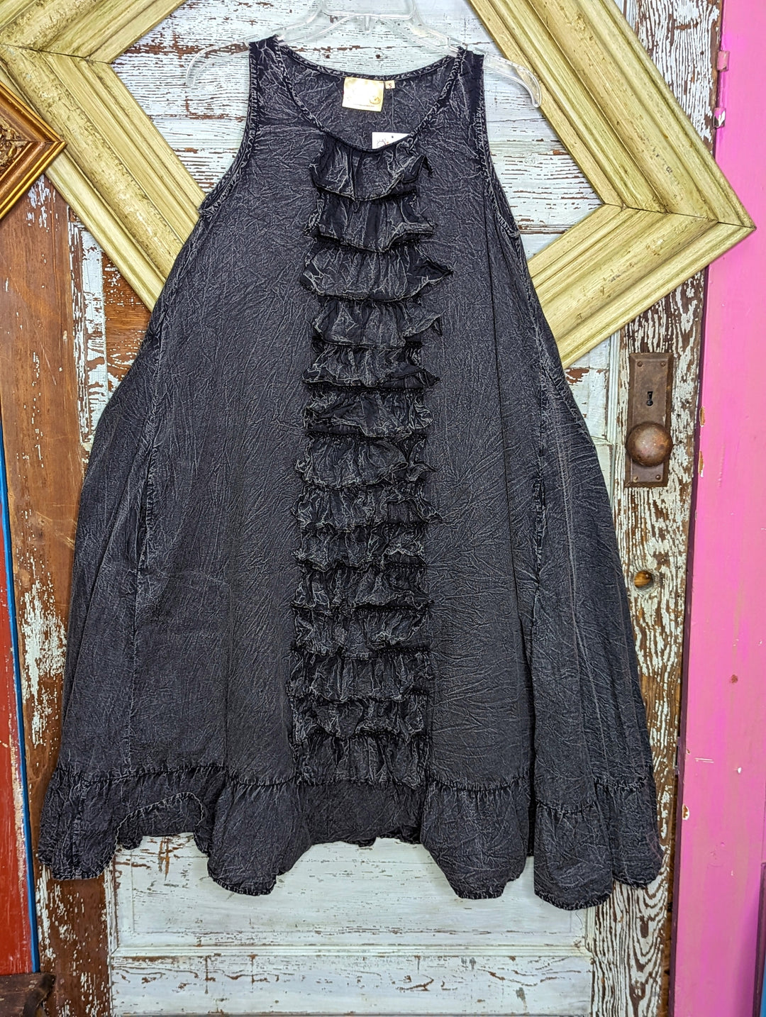 Flare sleeveless dress with ruffles