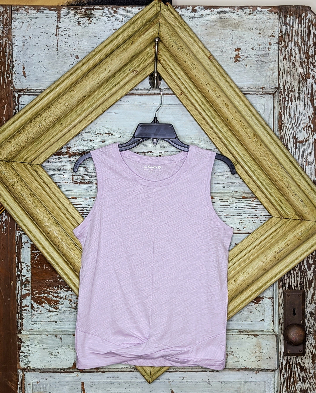 Sleeveless Tank With Twisted Hem at Front
