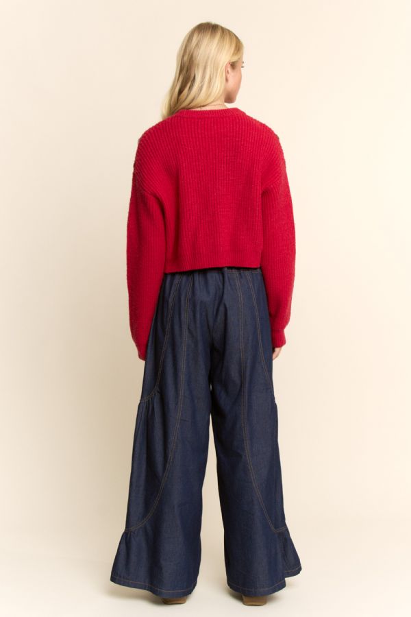 Red jewel embellished chunky knit sweater close up detail