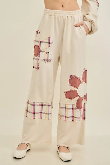 J.Her natural mineral washed flannel daisy pants front view with daisy appliqué detail