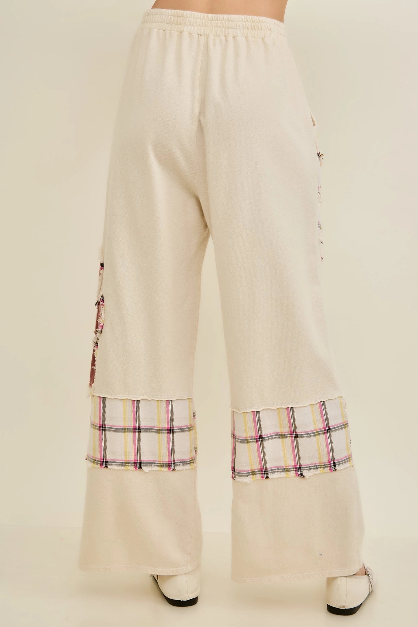 J.Her natural mineral washed flannel daisy pants back view with plaid panel hem detail