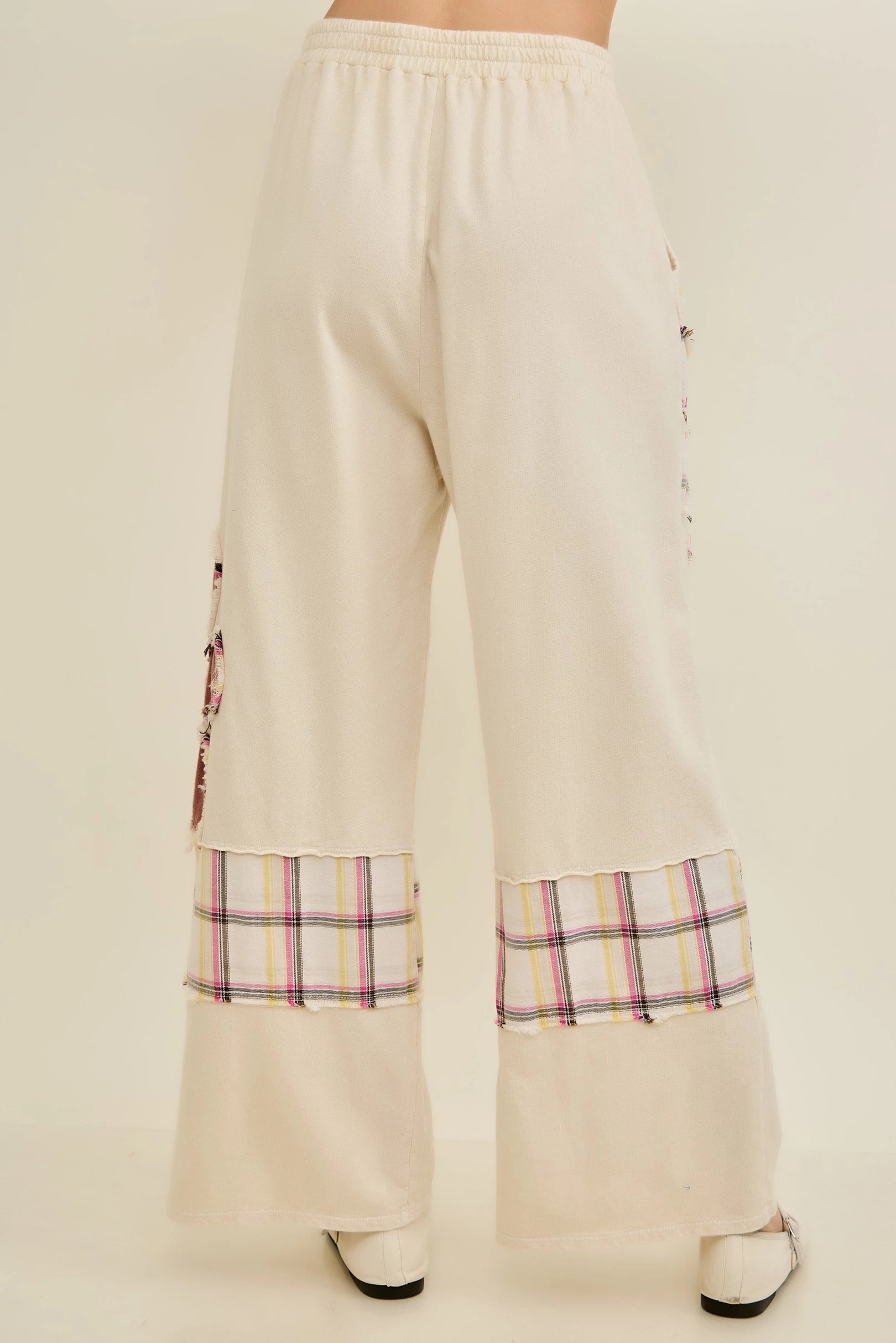 J.Her natural mineral washed flannel daisy pants back view with plaid panel hem detail