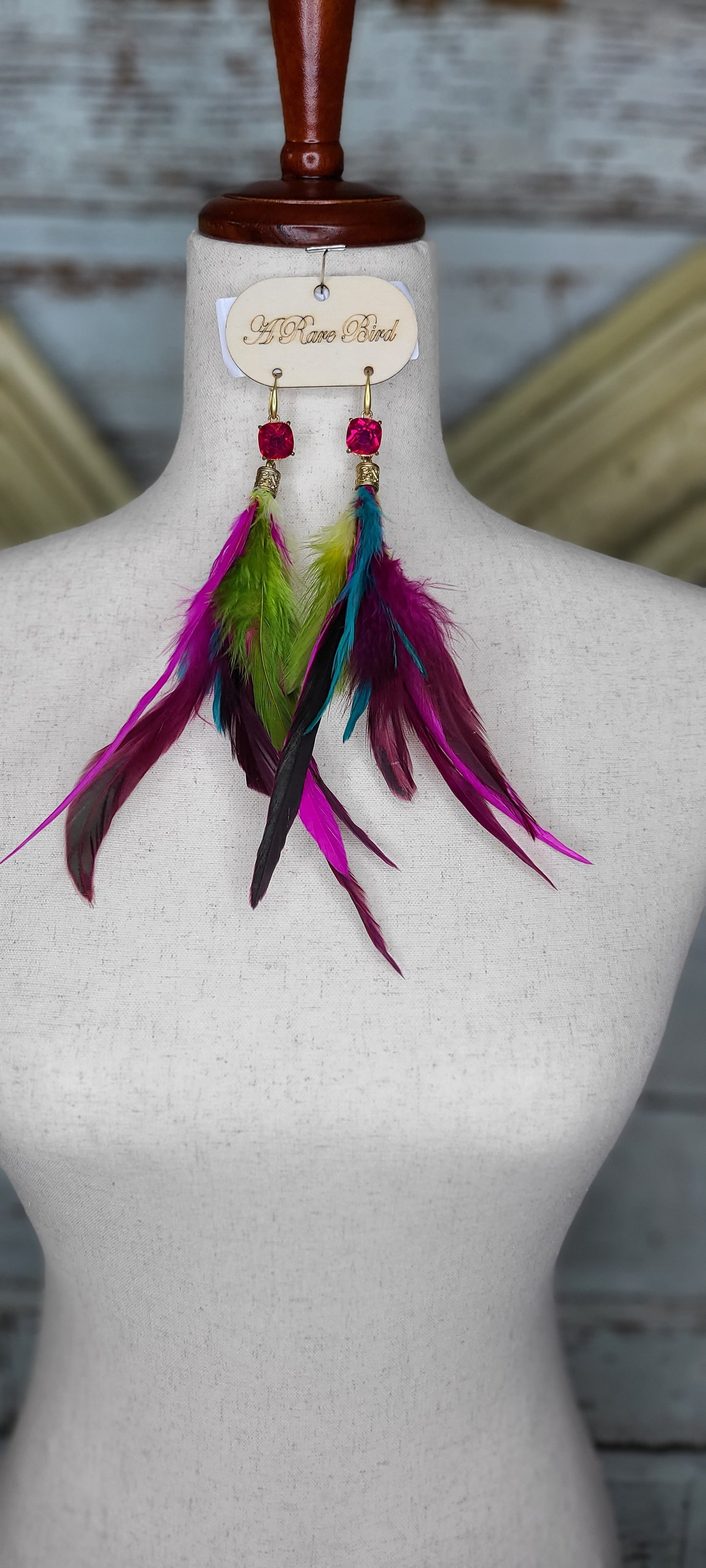 A rare Bird  Multi Color Feather Ears