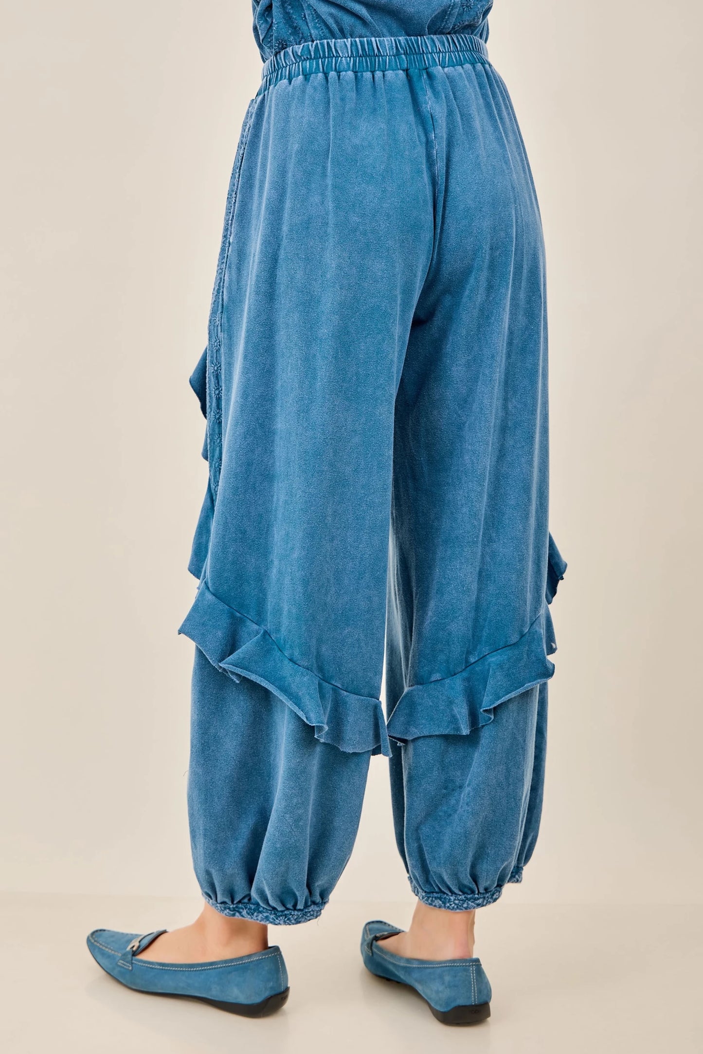 J.Her Mineral Washed Eyelet Ruffle Harem Pants in Slate Blue - Back view showing elasticized ankle cuffs