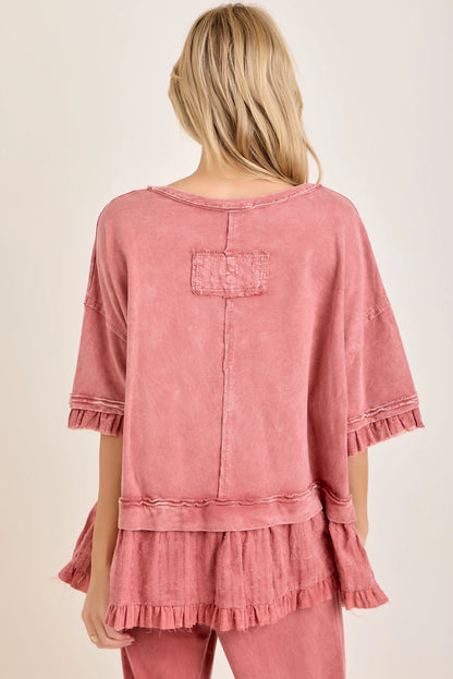 J.Her mineral washed bouclé eyelet ruffle top back view showing back patch pocket and ruffle hem