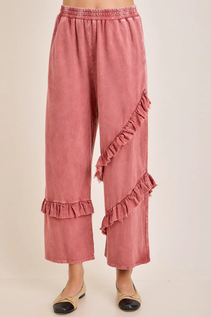 J.Her mineral washed ruffle pants front view showing diagonal ruffle detail