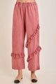 J.Her mineral washed ruffle pants front view showing diagonal ruffle detail