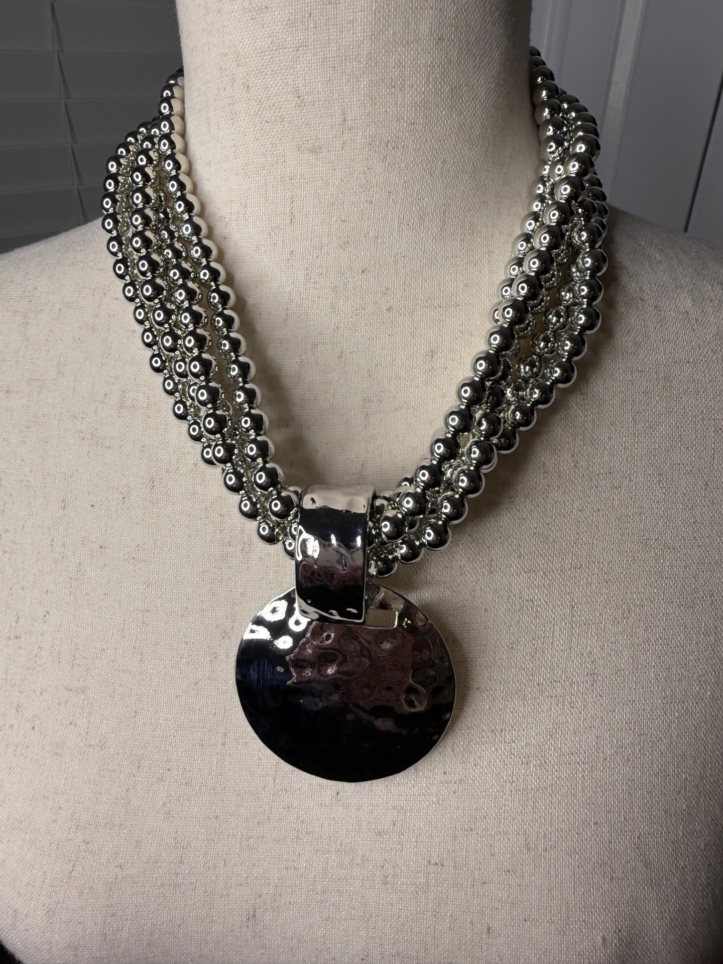 Multi-Strand Bead Necklace with Disc