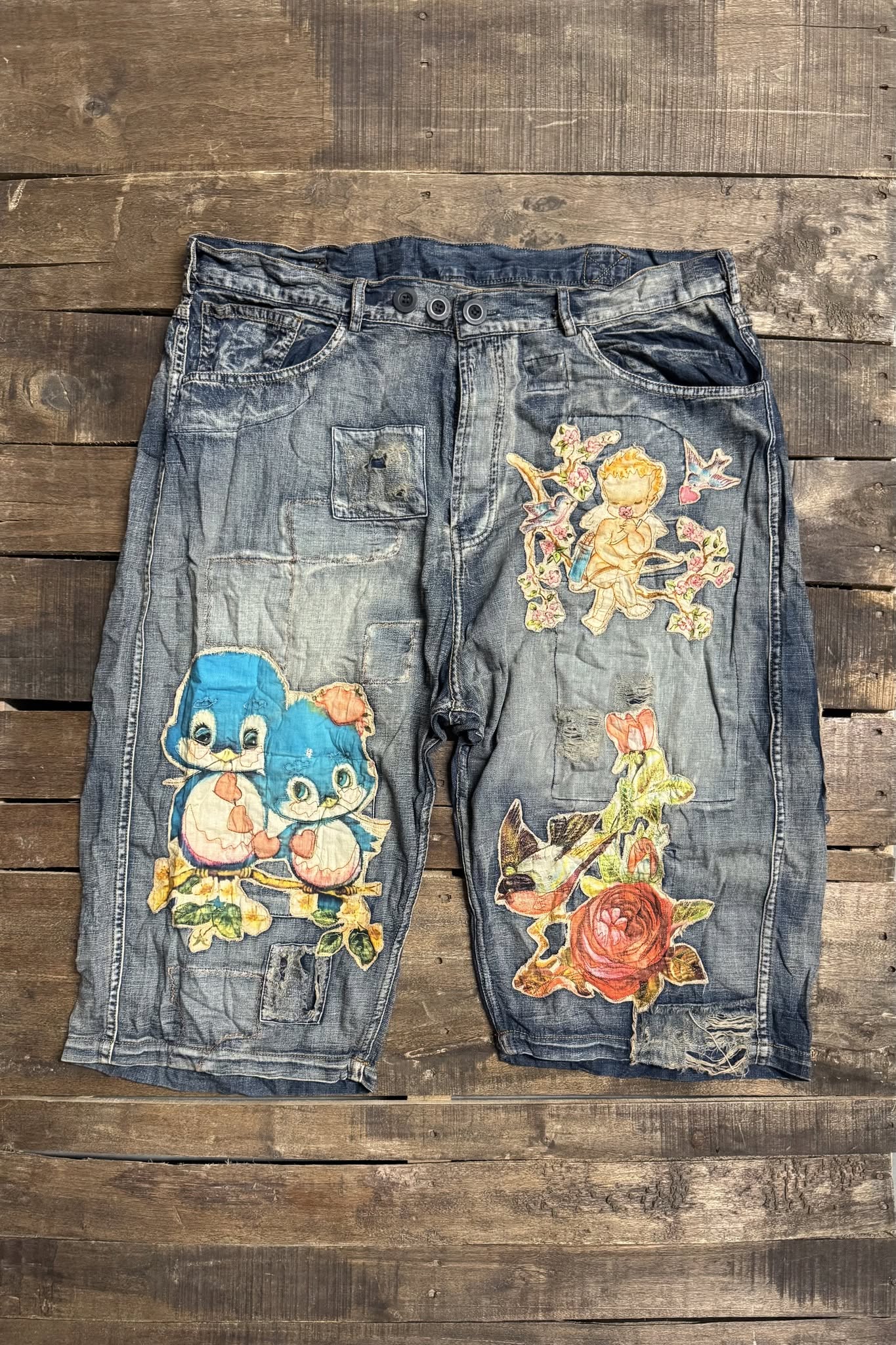 Desert Drift Shorts Flutter Away - front with character patches