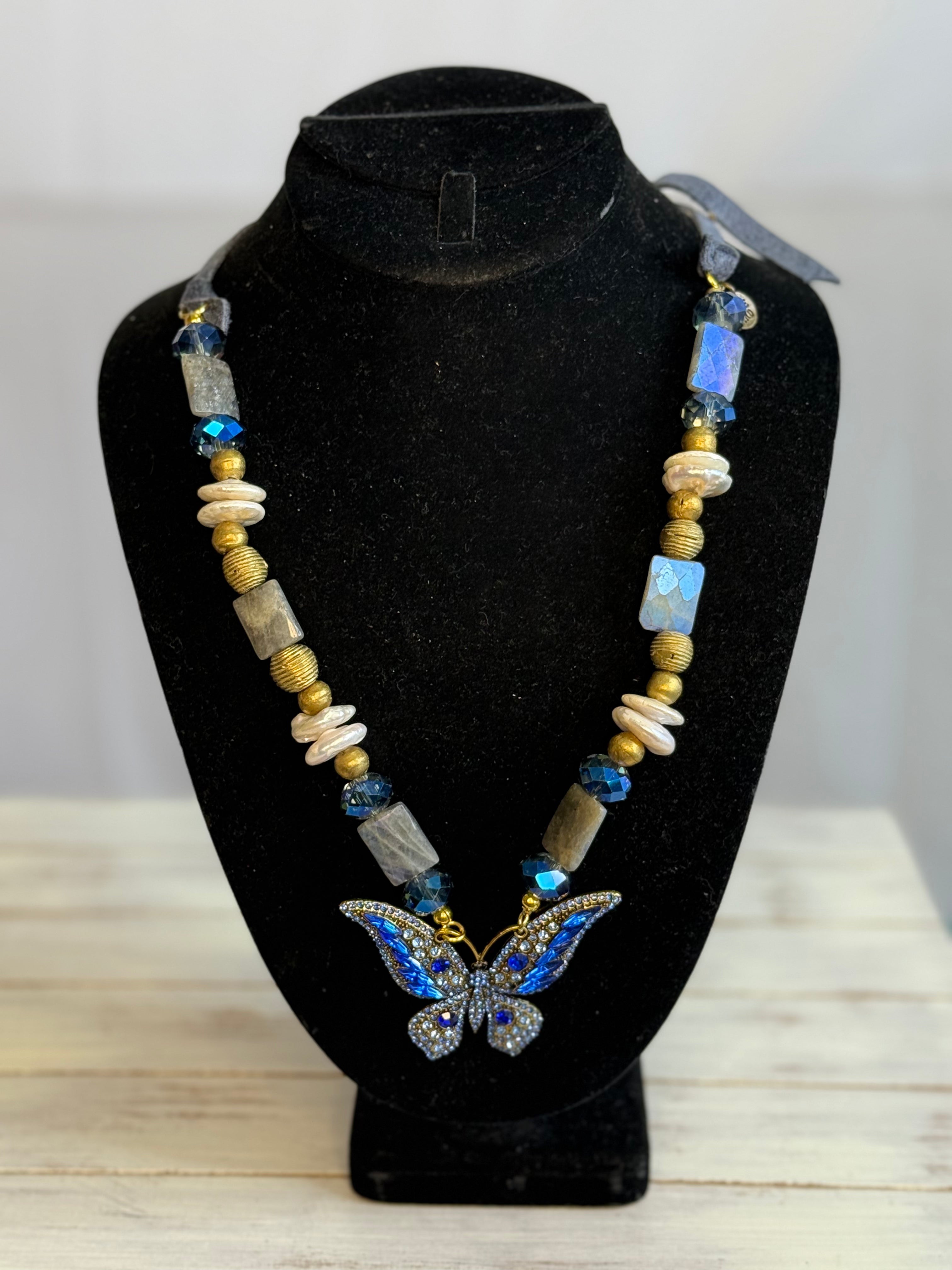 A Rare Bird Blue Butterfly Necklace
