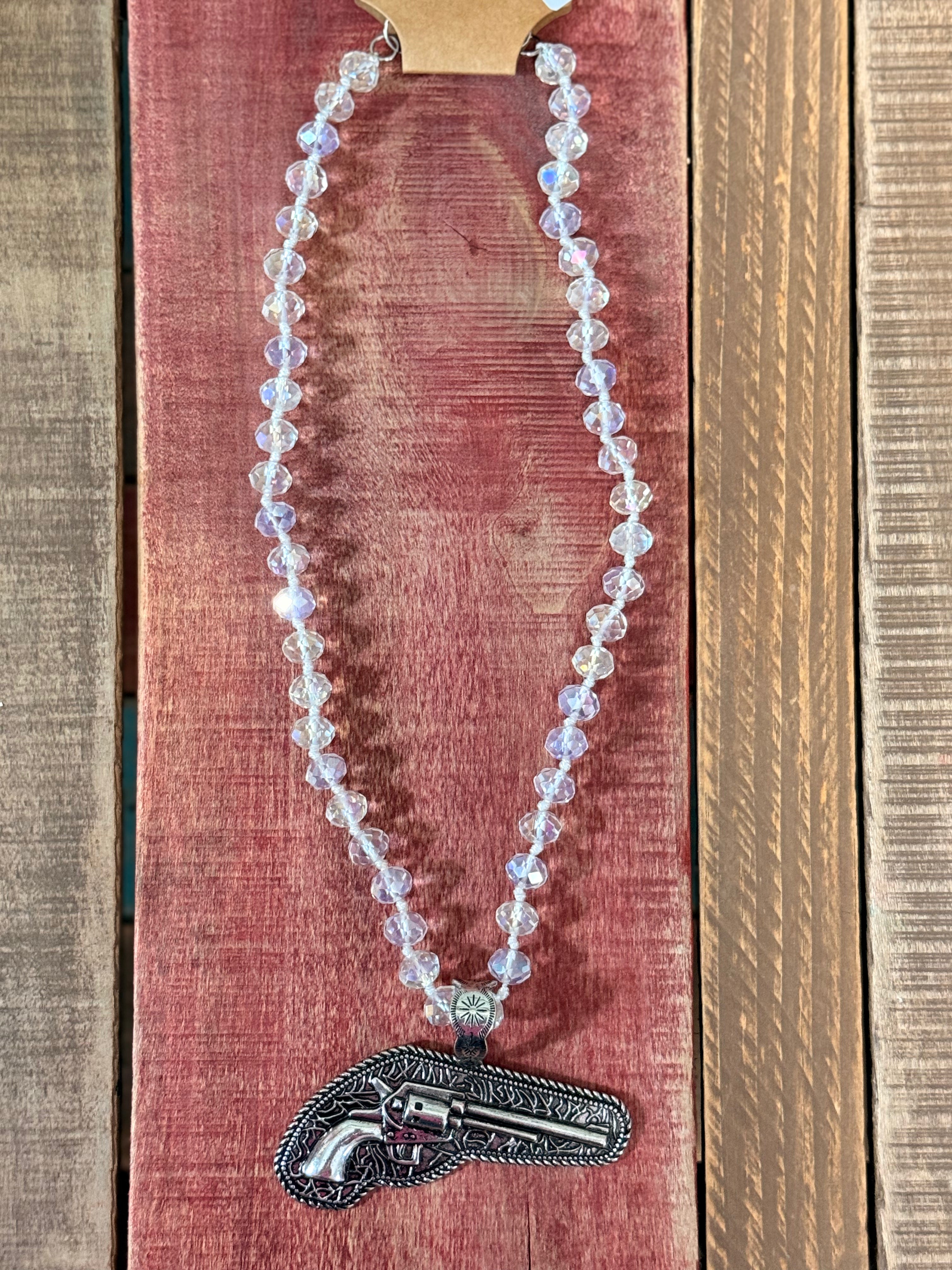 Silver toy gun with Crystal Necklace