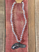 Silver toy gun with Crystal Necklace