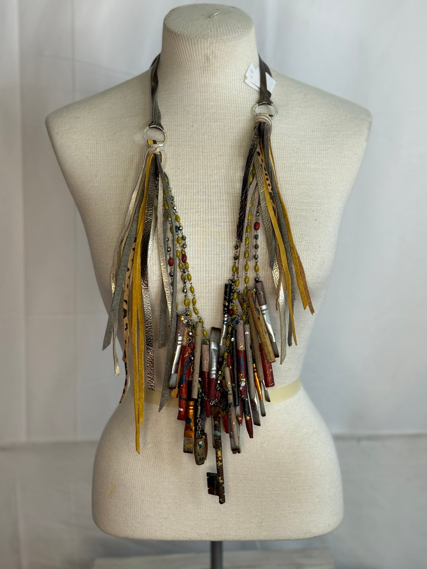 A Rare Bird Paintbrush and Pencil Necklace