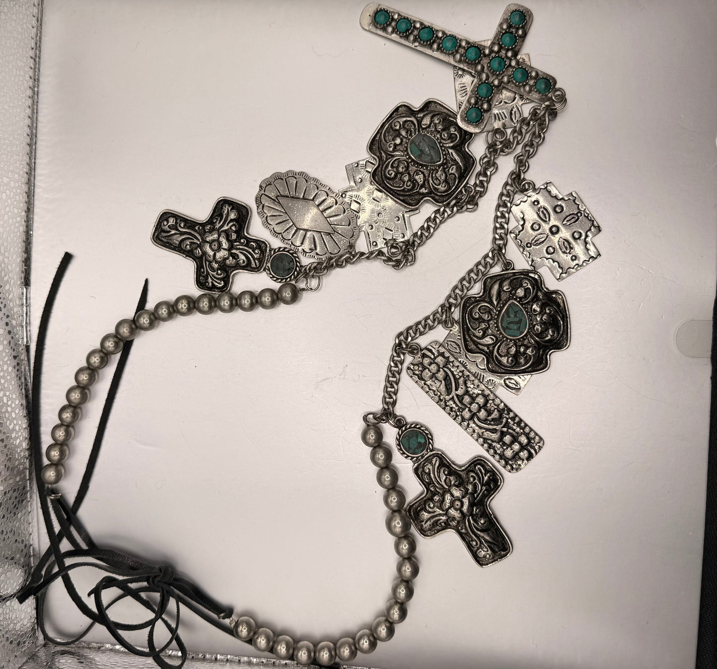 A rare bird turn silver cross multi necklace