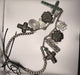 A rare bird turn silver cross multi necklace