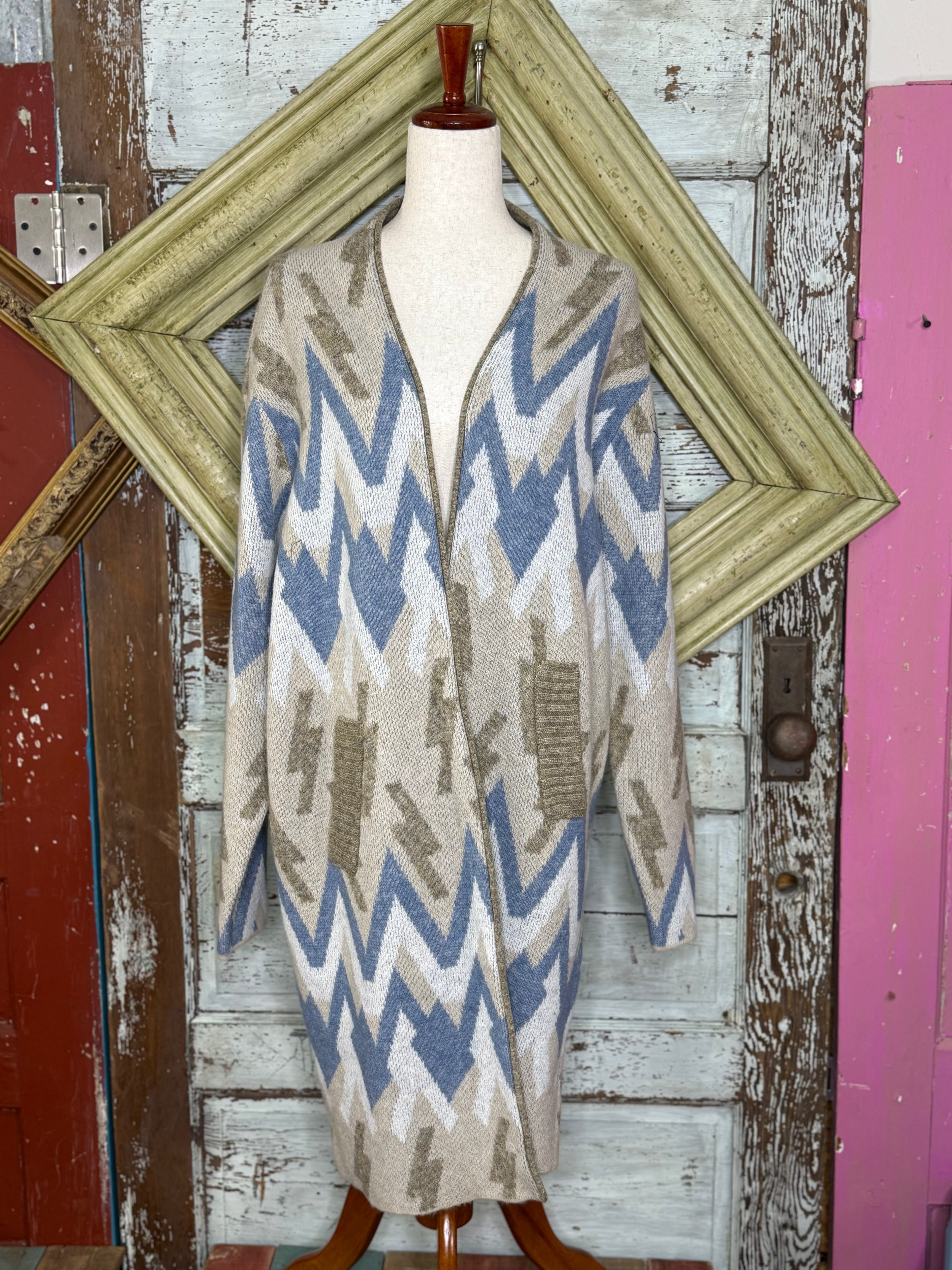 Cardigan with Geomatical jacquard patters