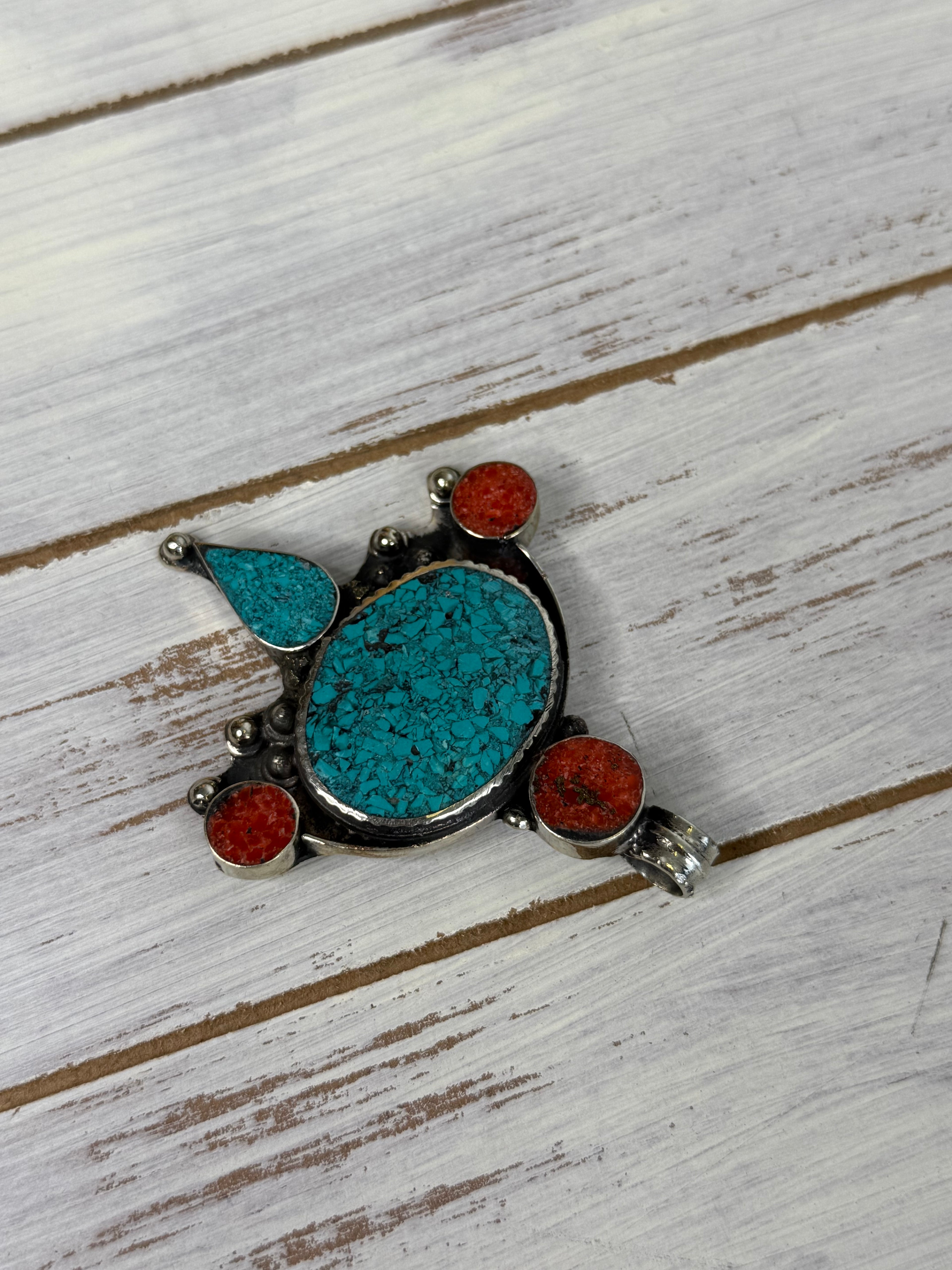 Turquoises and coral pendent