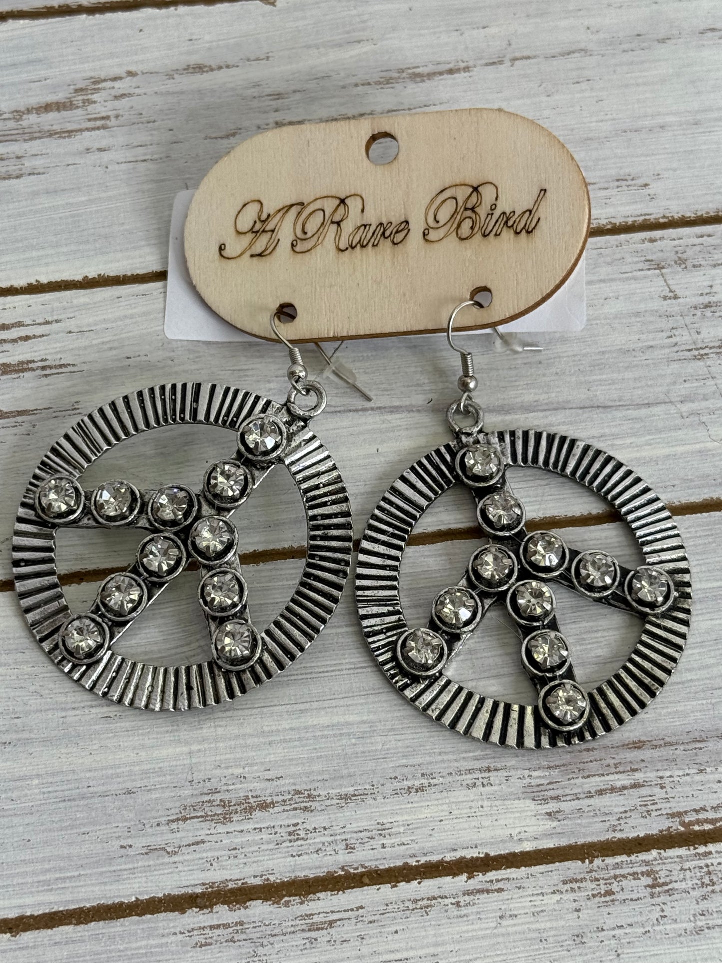 A Rare Bird Peace Earrings