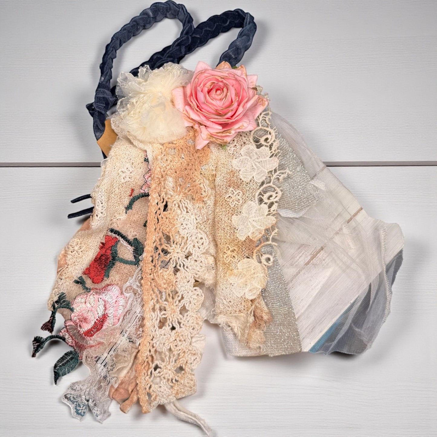 A Rare Bird Braded Lace neck with feathers and lace