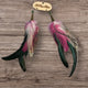 A Rare Bird Pink Black Feather Ears