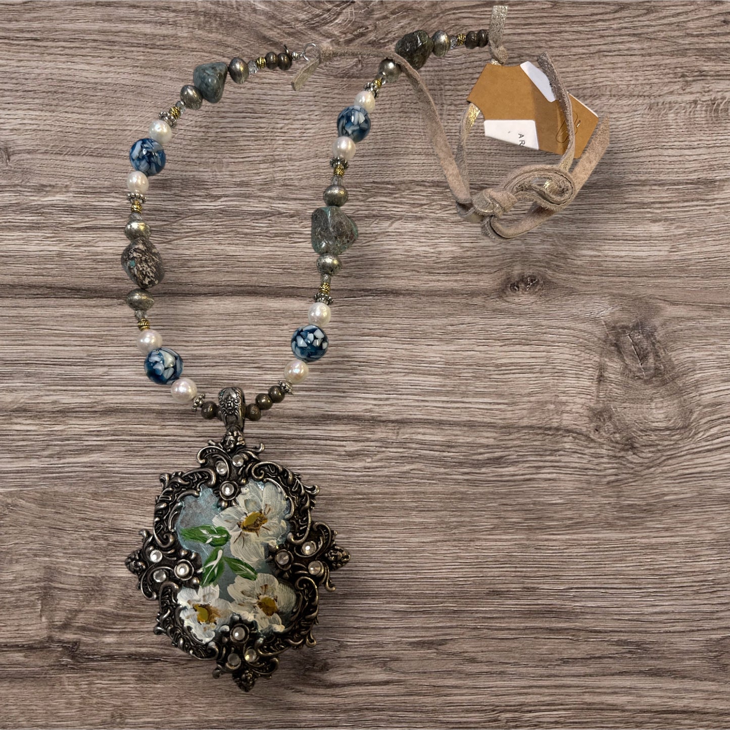 A Rare Bird Blue Flower Neckless