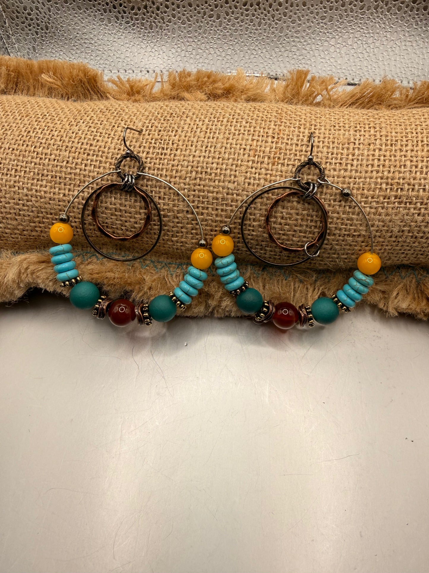 Lost and found multi head hoop earrings