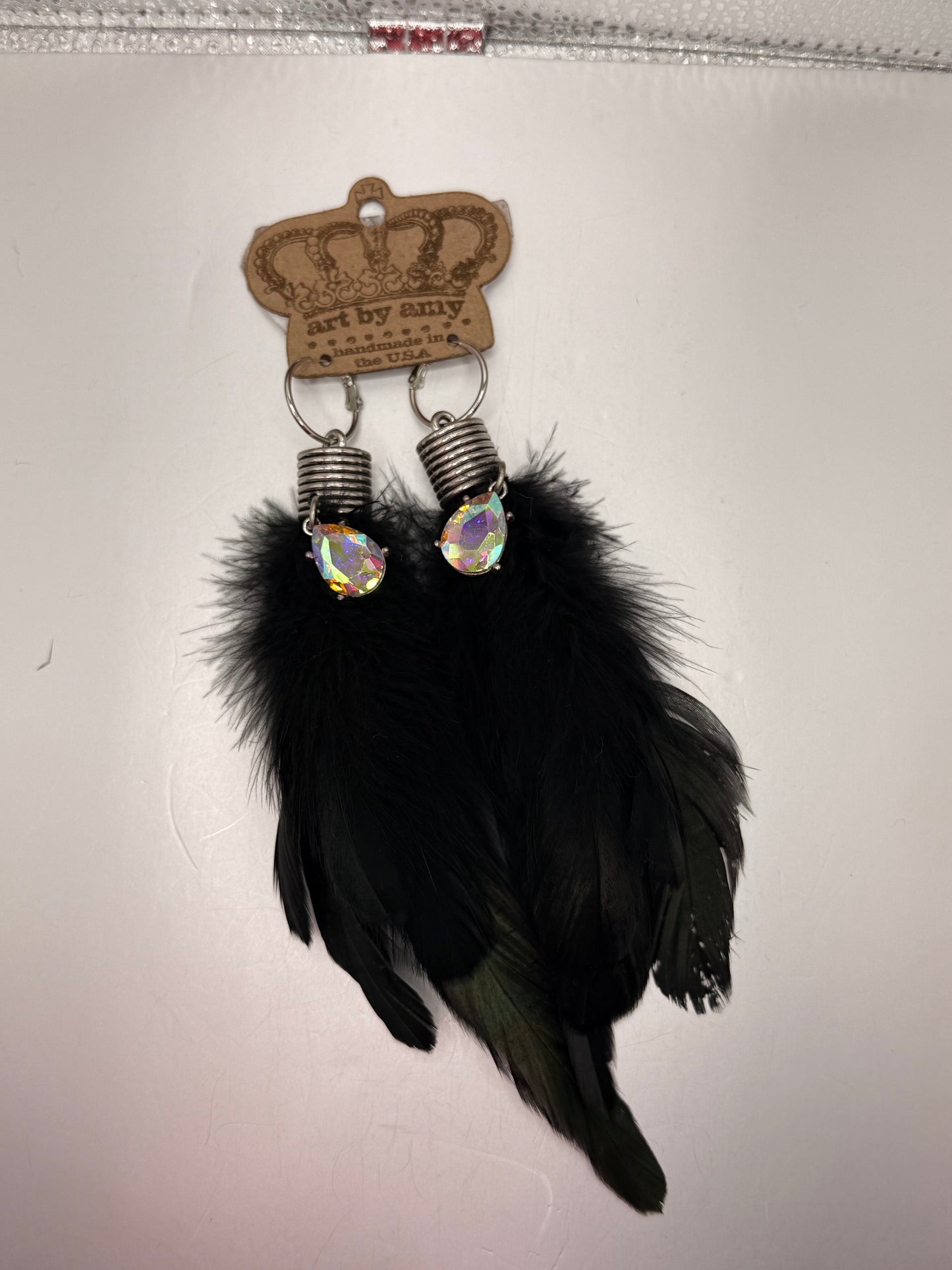 Art by Amy black feather earring