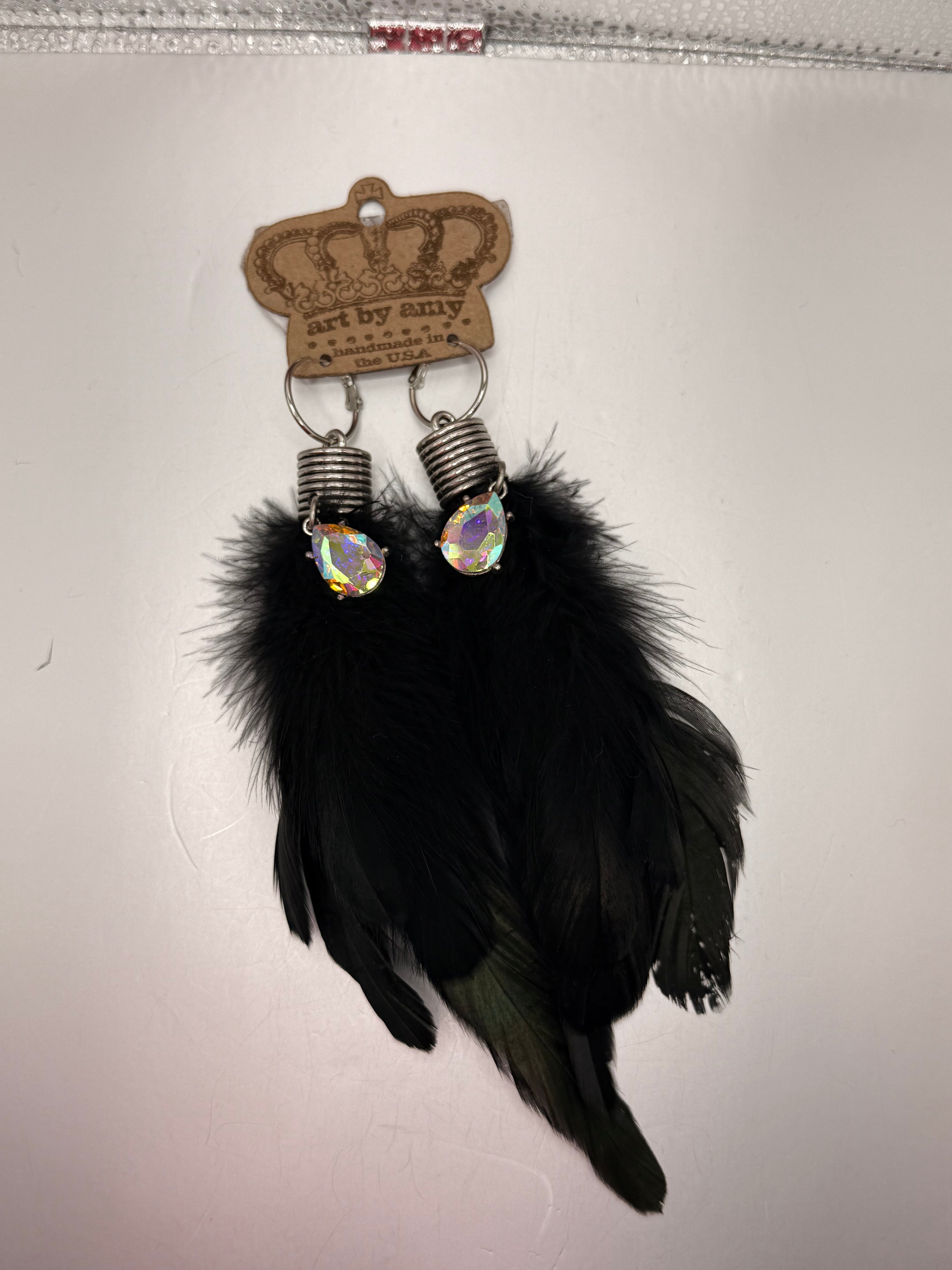 Art by Amy black feather earring