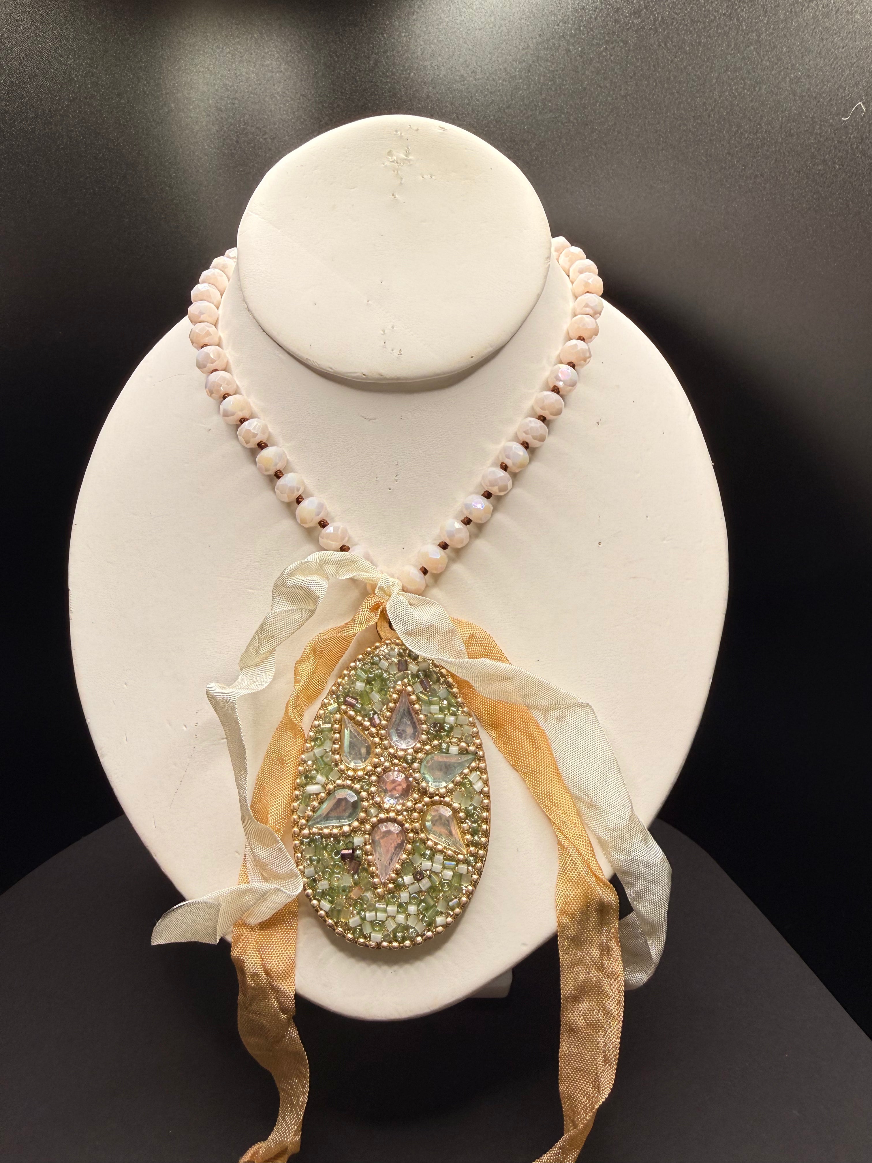 A Rare Bird Jeweled Egg Necklace