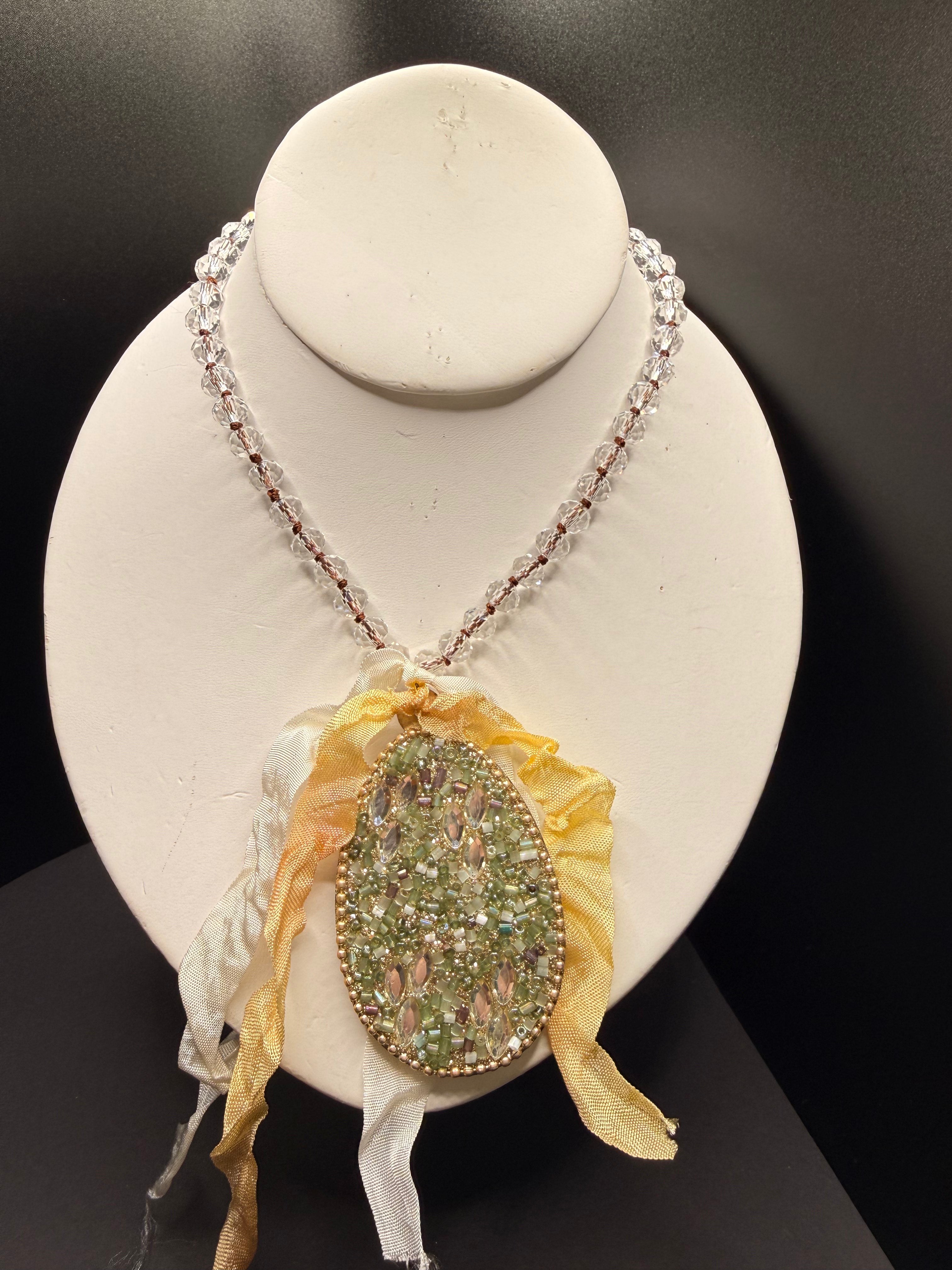 A Rare Bird Jeweled Egg Necklace