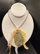 A Rare Bird Jeweled Egg Necklace