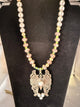 A Rare Bird Necklace