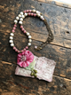 A Rare Bird Postcard Necklace