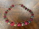Pink & Champagne graduated cushion-stone necklace with gold-tone settings, clasp at top