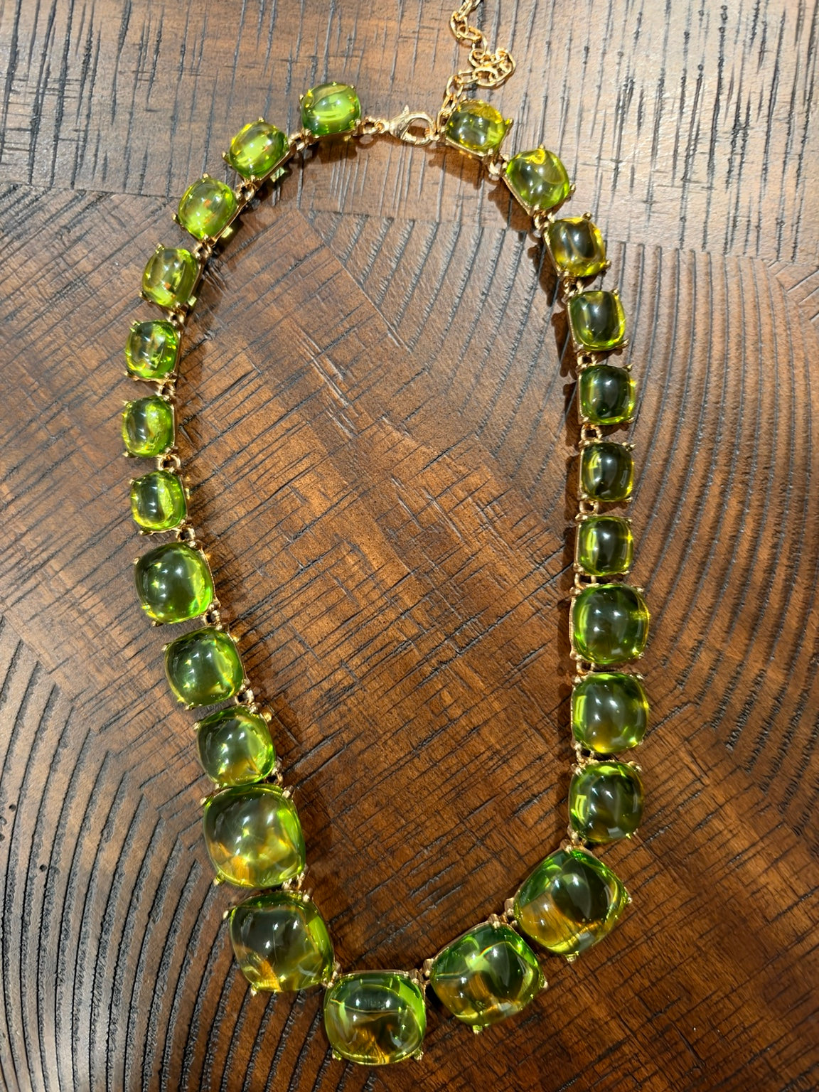 Lime Green graduated cushion-stone necklace with gold-tone settings, clasp at top