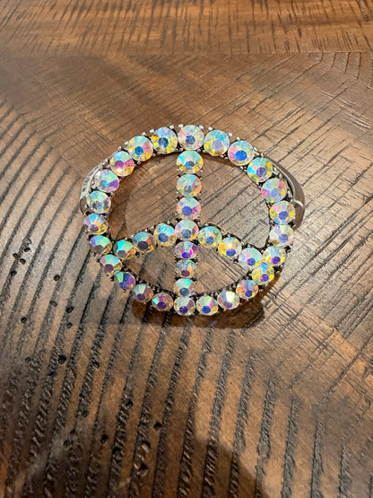 Silver-tone peace sign bracelet with aurora iridescent stones