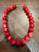 Cherry red round bead necklace with pale swirls and silver-tone clasp