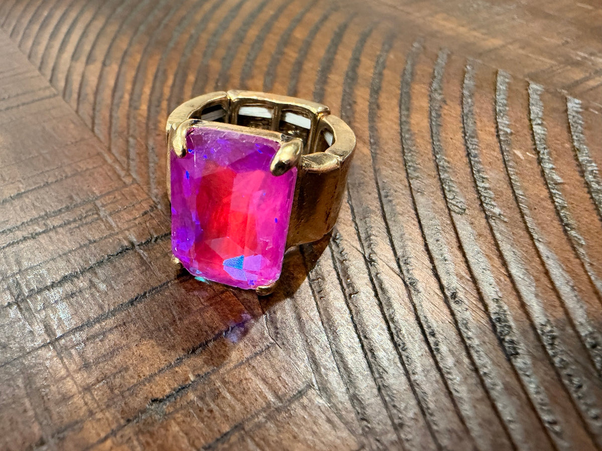 Pink iridescent rectangular stone ring with gold-tone stretch band