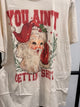 Keep It Gypsy You Ain't Gettin' Sh*t Santa Graphic Tee in cream with vintage Santa illustration
