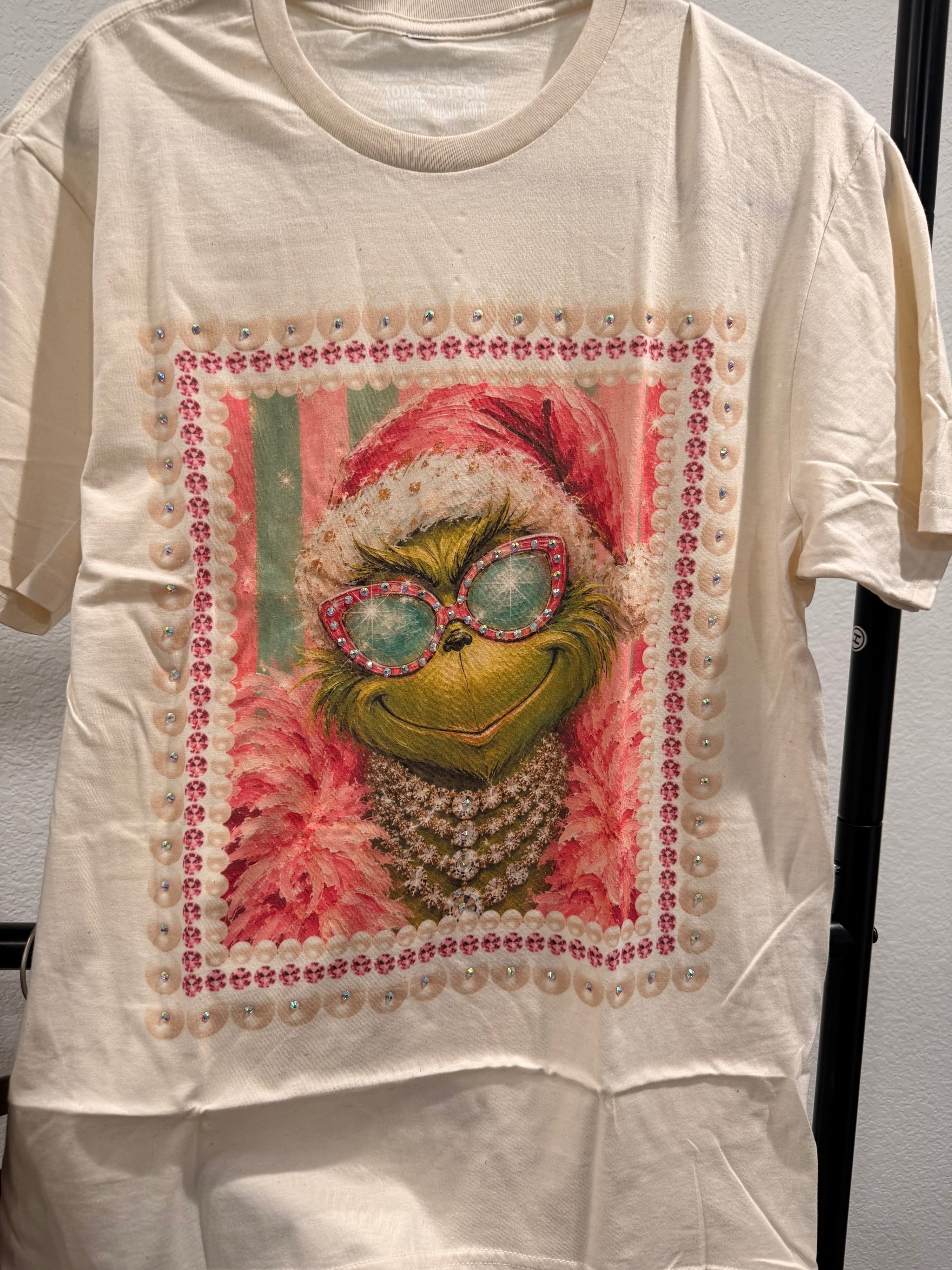 Keep It Gypsy Glam Grinch Rhinestone Graphic Tee in cream with pearl and rhinestone embellished frame