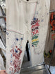Paper Lace PL-G721P white pants with colorful tea party graphics, stars, and contrast stitching