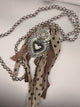 A Rare Bird Heart And Pearl Necklace