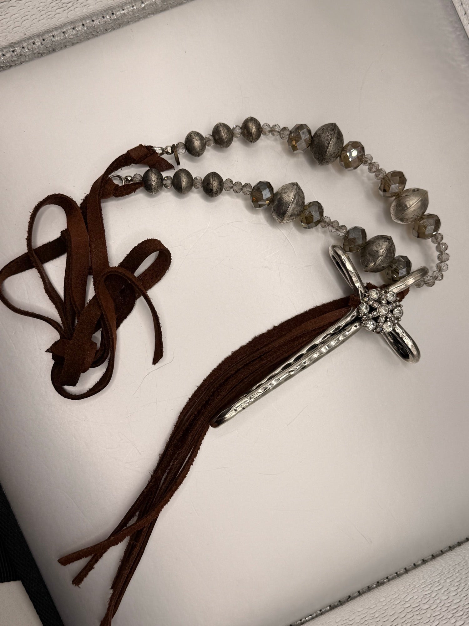 A Rare Bird Cross Necklace