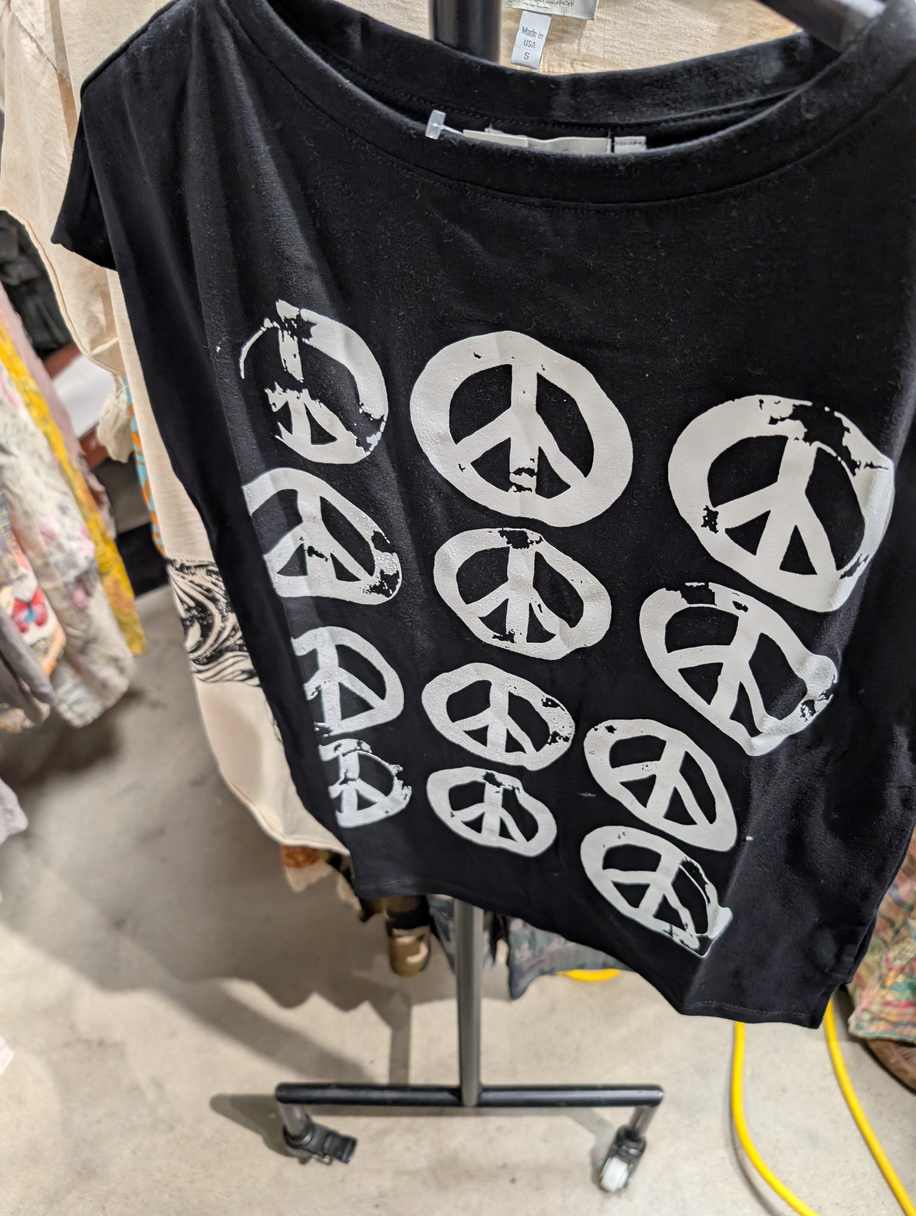 I Love Linen Graphic Tee - black boxy tee with all-over white distressed peace sign print