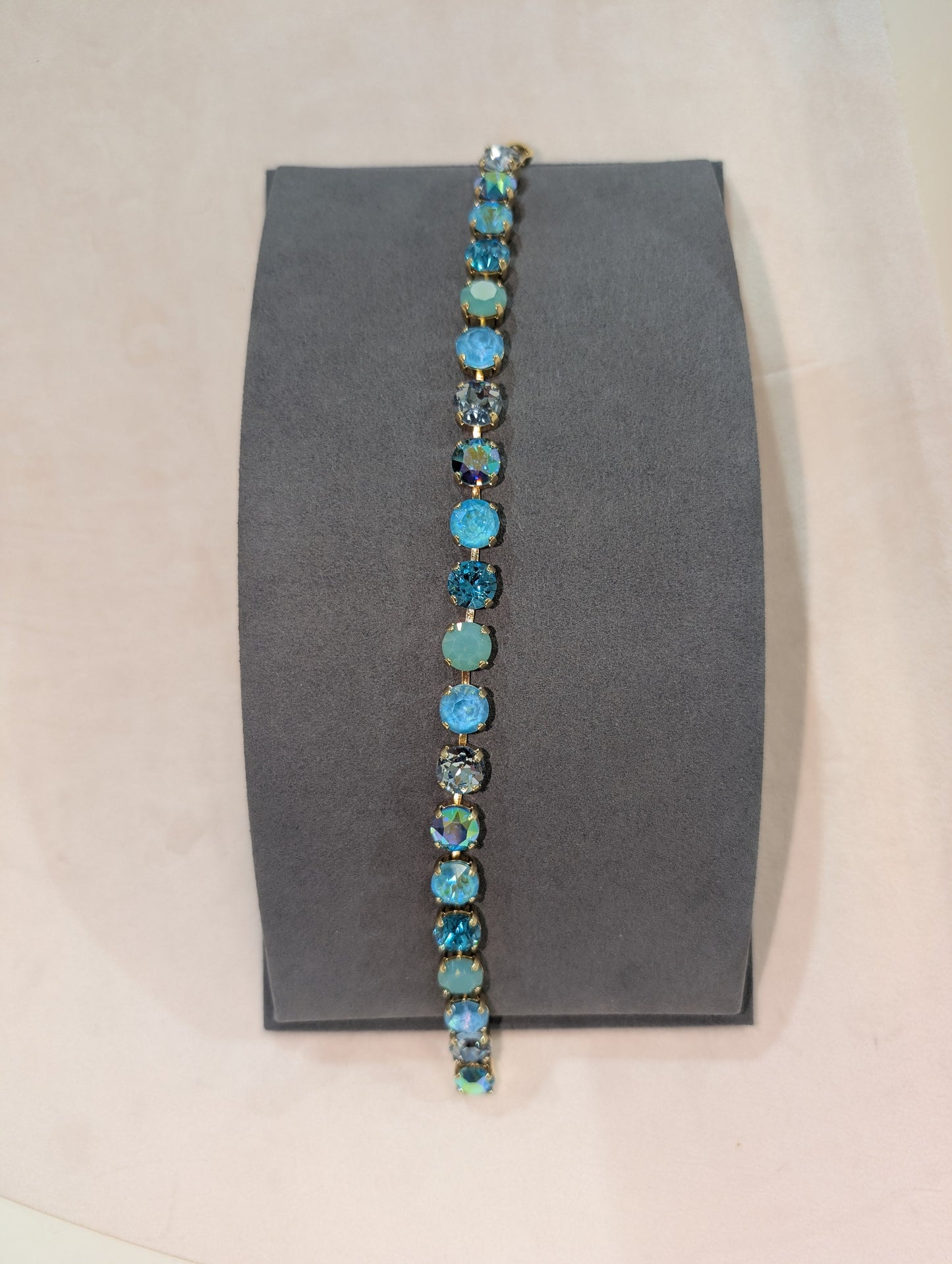 Wafa Lariat Aqua Multi Stone Bracelet - slim tennis bracelet with aqua, teal, sky blue opal and clear crystal stones in gold settings