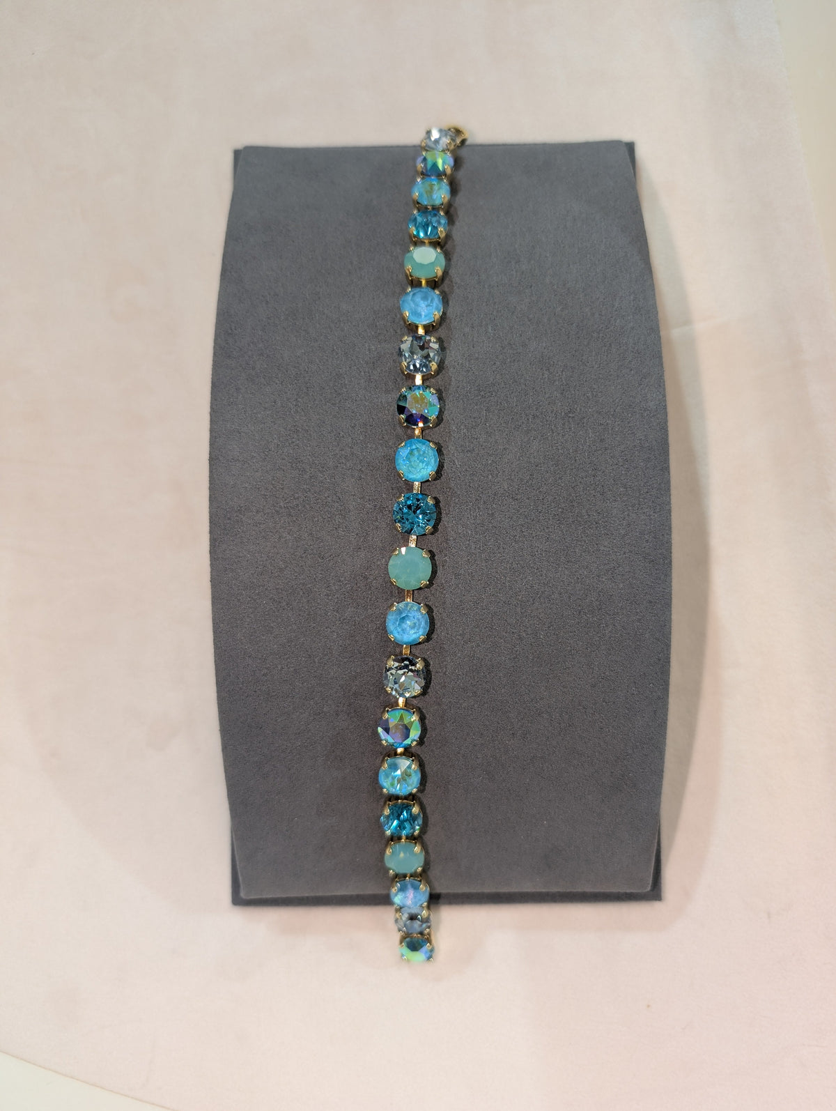 Wafa Aqua Dream Crystal Lariat with aqua, teal, mint and iridescent round crystals in gold-tone settings