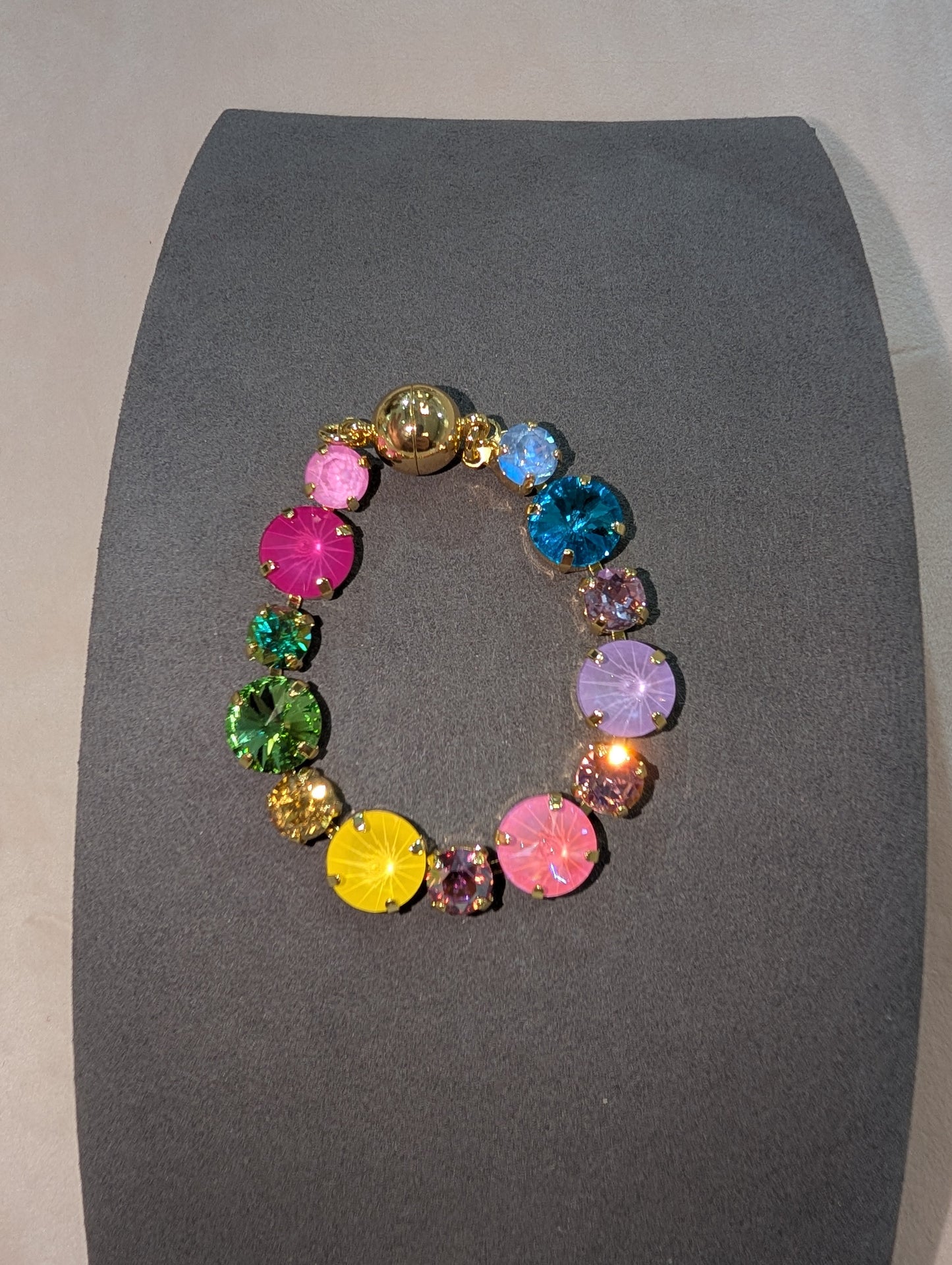 Wafa Multi Color Bracelet - full circle rainbow crystal bracelet with mixed size stones in gold prong settings and gold magnetic clasp