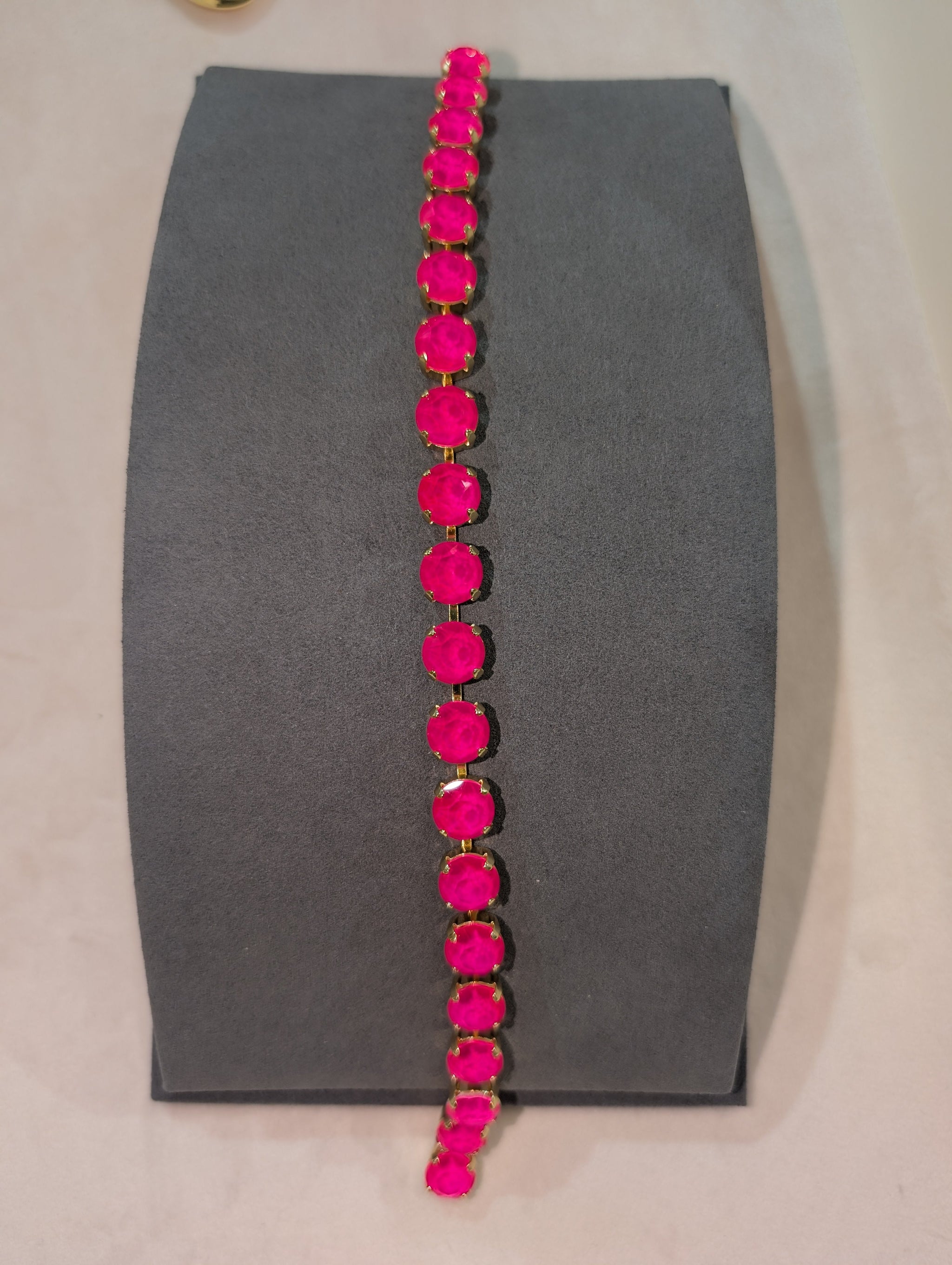Wafa Neon Pink Lariat - tennis style lariat necklace with neon hot pink round crystal stones in gold prong settings