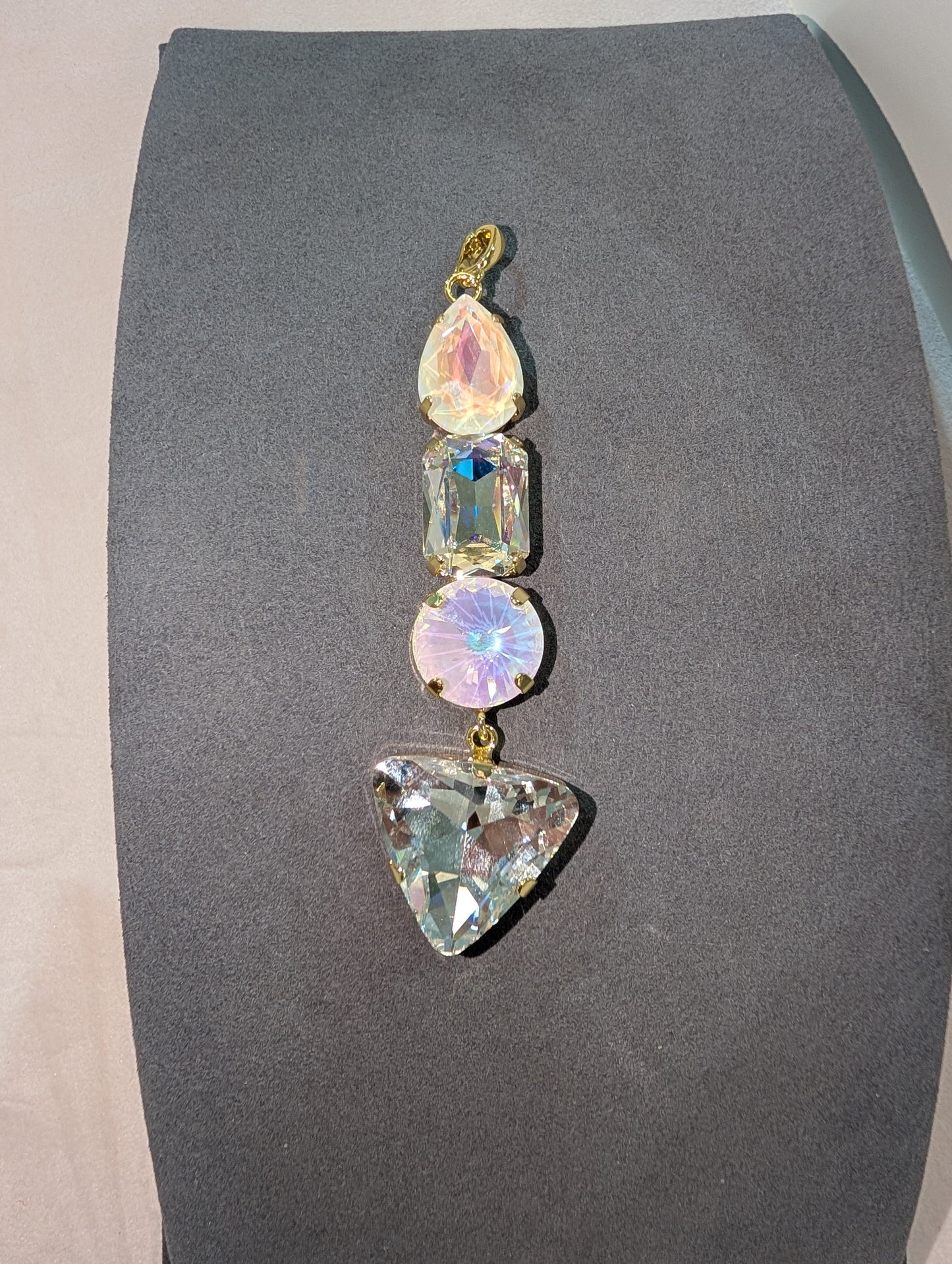 Wafa 4 Stone Charm Aurora - stacked pendant with blush pink opal teardrop, clear AB emerald cut, pink opal round, and aqua clear triangle stones in gold settings